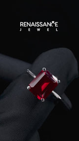 Silver Emerald Cut Ruby Solitaire Engagement Ring with Round Band and Four-Prong Setting