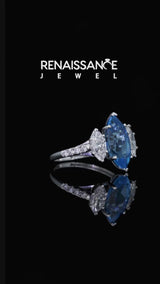 Silver Three-Stone Marquise Cut Blue Topaz Ring with Round  Pavé Band and Prong Setting