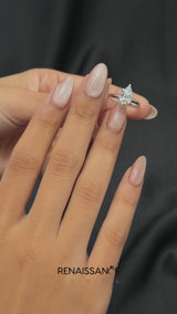 Platinum Pear Cut Diamond Solitaire Engagement Ring with Round Band and Four-Prong Setting