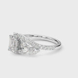 Platinum Emerald Diamond Halo Ring with Marquise and Pavé Band in Prong Setting