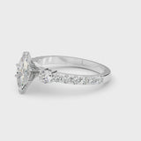 Platinum Marquise Cut Diamond Solitaire Ring with Four-Prong Setting and Twisted Pavé Band