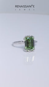 White gold Fancy Green Emerald Cut Diamond Solitaire Ring with Flower Prong Setting and Classic Band