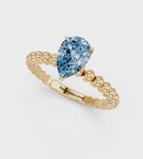 Yellow gold Fancy Blue Pear Cut Diamond Solitaire Ring with Beaded Band and Prong Setting