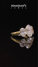 Yellow gold Three-Stone Oval Diamond Ring with Channel Band and Prong Setting