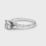 Platinum Round Cut Diamond Solitaire Ring with Side Stones and Four-Prong Setting