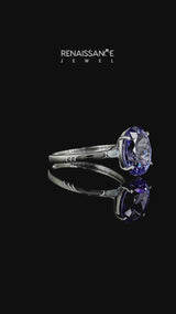 Silver Oval Cut Tanzanite Solitaire Engagement Ring with Classic Band and Four-Prong Setting