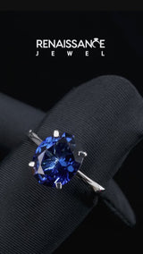 Silver Oval Cut Blue Sapphire Solitaire Engagement Ring with Classic Band and Four-Prong Setting