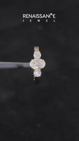 Yellow gold Three-Stone Oval Diamond Ring with Round Side Stones, Classic Band, and Four-Prong Setting