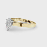 Yellow gold Pear Solitaire Engagement Ring with Six-Prong Setting and Tapered Band