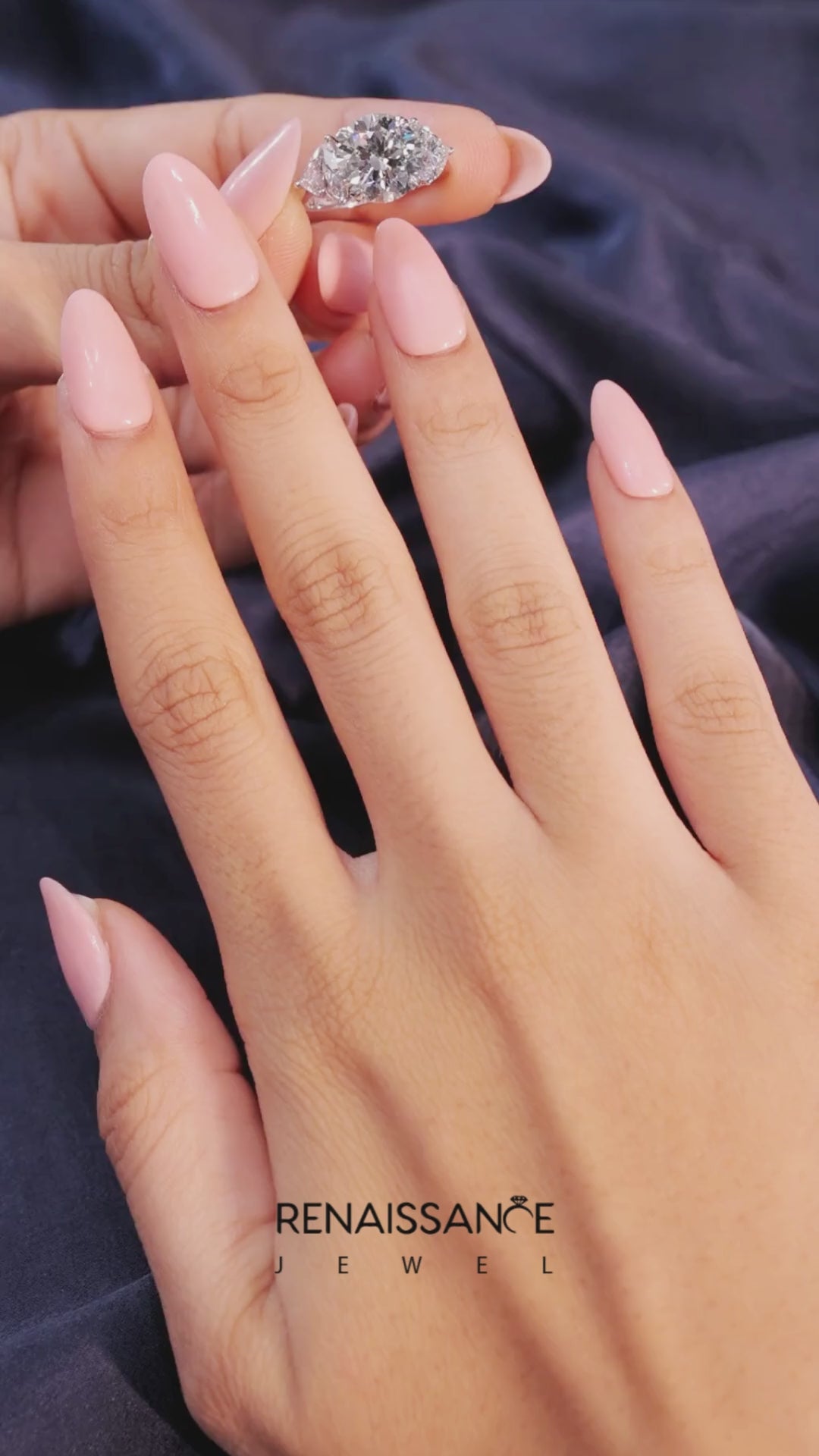 Silver Three-Stone Round Diamond Ring with Pear Side Stones on a Platinum Band with Four-Prong Setting 7