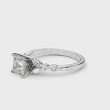 Silver Princess Cut Diamond Solitaire Ring with Side Stones and Four-Prong Setting