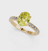 Yellow gold Fancy Yellow Oval Cut Diamond Solitaire Pavé Band with Four-Prong Setting