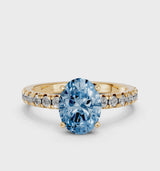 Yellow gold Fancy Blue Oval  Solitaire Pave Diamond Engagement Ring with Four-Prong Setting
