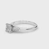 Silver Cushion Solitaire with Tapered Baguette Side Stones on a Classic Band with Four-Prong Setting