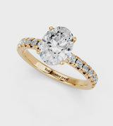 Yellow gold Oval Solitaire Pave Diamond Engagement Ring with Four-Prong Setting