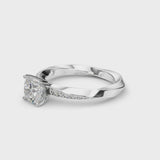 Platinum Cushion Cut Diamond Engagement Ring with Side Stone Accents and Four-Prong Setting
