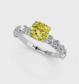 Platinum Fancy Yellow Cushion Cut Diamond Prong Setting with Side Stones on a Pave Band