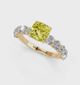 Yellow gold Fancy Yellow Cushion Cut Diamond Prong Setting with Side Stones on a Pave Band