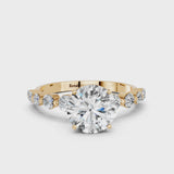 Yellow gold Round Cut Solitaire Diamond Ring with Pave Band and Four-Prong Setting