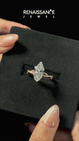 Rose gold Marquise Cut Diamond Solitaire Engagement Ring with Twisted Pavé Band and Four-Prong Setting