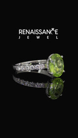 Silver Oval Cut Peridot Solitaire Ring with Round Pavé Band and Four-Prong Setting