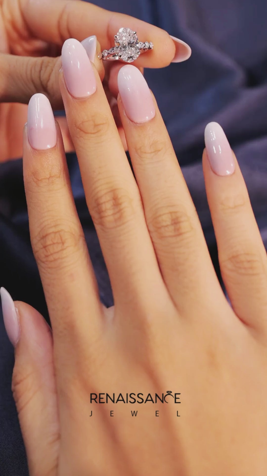 Platinum Oval Solitaire with Side Stones on a Pavé Band and Four-Prong Setting 6