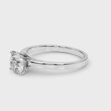 Silver Asscher Solitaire Diamond Engagement Ring with Four-Prong Setting on a Classic Band