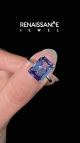 Silver Emerald Cut Tanzanite Solitaire Engagement Ring with Round Band and Four-Prong Setting