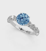 Silver Fancy Blue Round Cut Diamond Prong Setting with Side Stones on a Pave Band