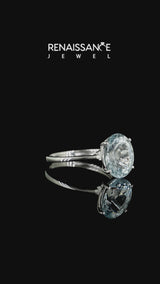 Silver Oval Cut Aquamarine Solitaire Engagement Ring with Classic Band and Four-Prong Setting