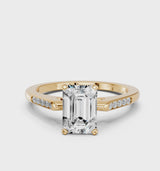 Yellow gold Emerald Cut Channel Set Solitaire Engagement Ring with Four-Prong Setting