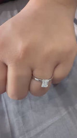 White gold Emerald Solitaire Engagement Ring with Cathedral Band and Four-Prong Setting
