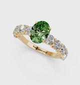 Yellow gold Fancy Green Oval Cut Diamond Prong Setting with Side Stones on a Pave Band