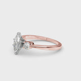 Rose gold Three-Stone Marquise Solitaire Ring with Tapered Band and Four-Prong Setting