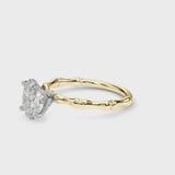Yellow gold Oval Solitaire Diamond Ring with Bamboo Band and Four-Prong Setting