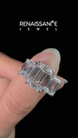 White gold Emerald Cut Diamond Three-Stone Ring with Channel Set Band and Four-Prong Setting