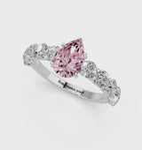 Silver Fancy Pink Pear Cut Diamond Prong Setting with Side Stones on a Pave Band
