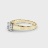 Yellow gold Oval Solitaire Engagement Ring with Four-Prong Setting and Tapered Band