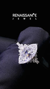 Silver Marquise Cut Moissanite Ring with Side Stones and Four-Prong Setting