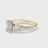 Yellow gold Emerald Cut Diamond Engagement Ring with Baguette Side Stones and Channel Set Band