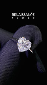 Silver Heart Cut Moissanite Solitaire Ring with Flower Prong Setting and Classic Band