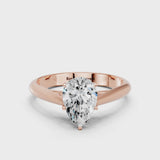 Rose gold Pear Cut Diamond Solitaire Engagement Ring with Cathedral Setting and Four-Prong Mount