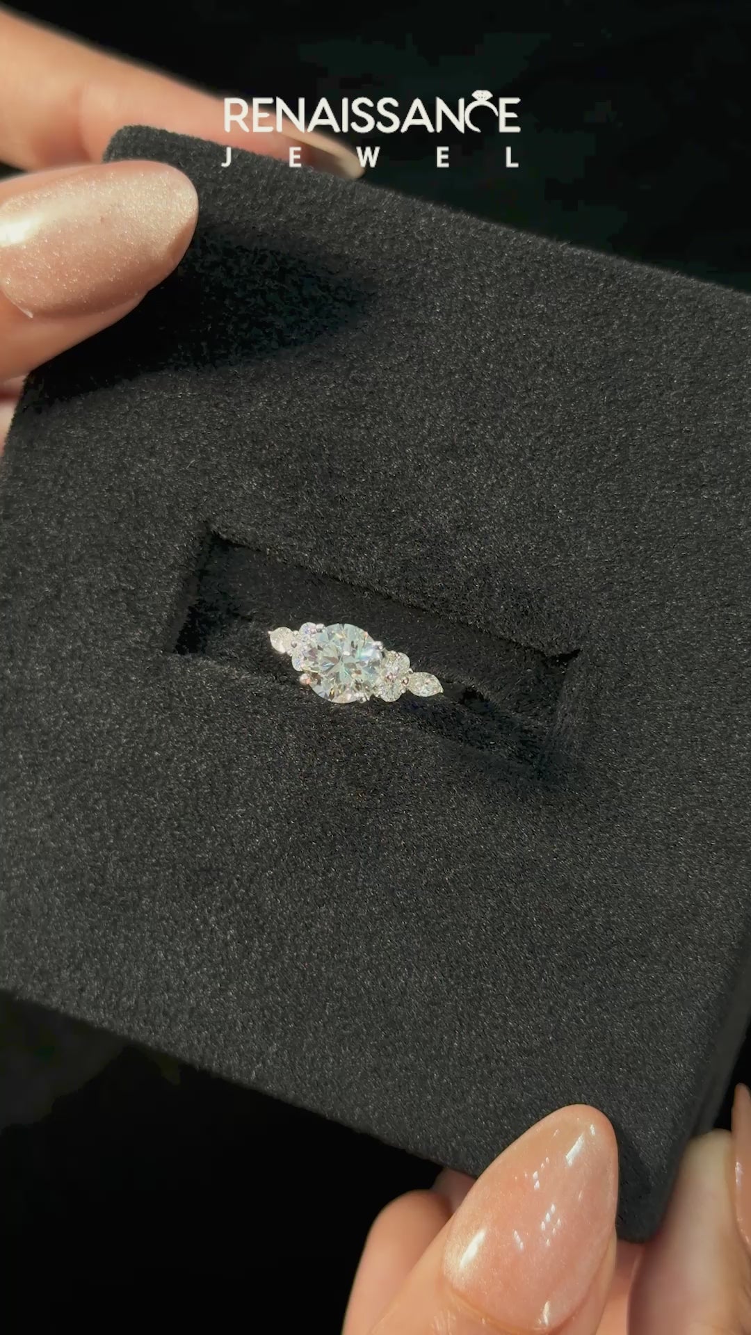 Silver Round Brilliant Diamond Solitaire Ring with Pear Side Stones and Four-Prong Setting_22