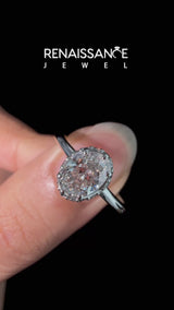 Silver Oval Brilliant Solitaire Engagement Ring with Six-Prong Setting and Classic Band