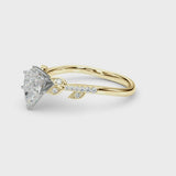 Yellow gold Pear Solitaire Leaf-Inspired Diamond Ring with Pavé Band and Four-Prong Setting
