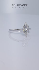 White gold Marquise Cut Diamond Solitaire Engagement Ring with Classic Band and Four-Prong Setting