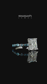 Silver Radiant Cut Diamond Ring with Marquise and Round with Blue Topaz side stone Side Stones and Four-Prong Setting