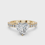 Yellow gold Heart Cut Diamond Solitaire Pavé Band with Four-Prong Setting