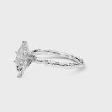 Silver Marquise Solitaire Diamond Ring with Bamboo Band and Four-Prong Setting