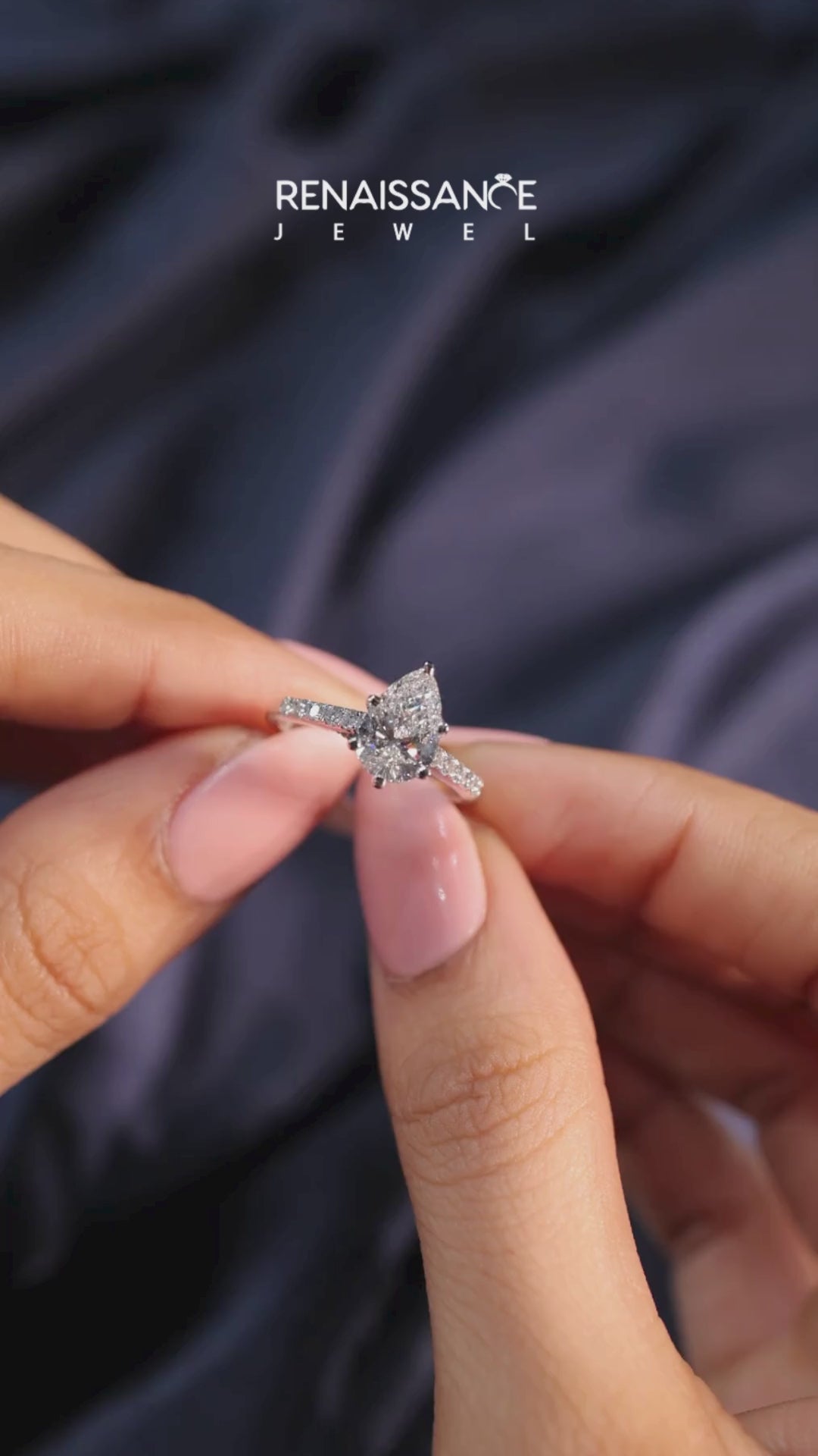 Silver Pear Solitaire Diamond Ring with Pavé Band and Four-Prong Setting 8